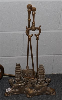 Lot 271 - A set of three Georgian style fire irons; and a pair of andirons in the form of dolphins and ships