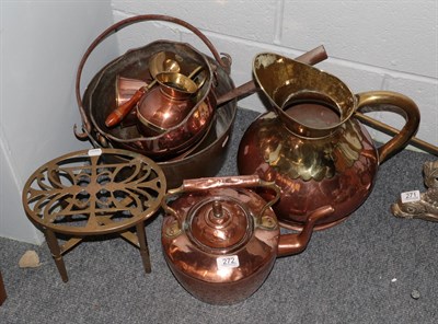 Lot 272 - A selection of copper and brass ware including jug, copper kettle, trivet, pedestal bowl, jam...