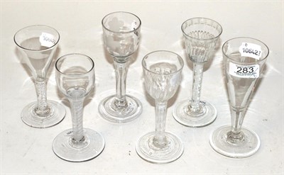 Lot 283 - Four 18th century opaque twist glasses, of various designs and forms; together with an 18th century