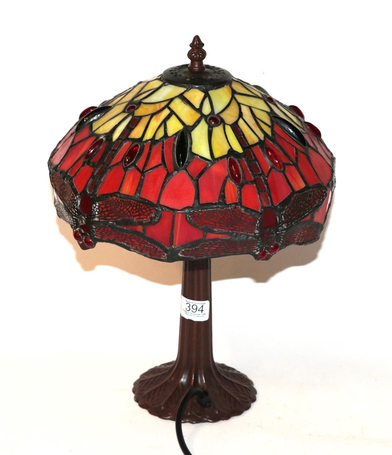 Lot 394 - A Tiffany style table lamp decorated with dragonflies