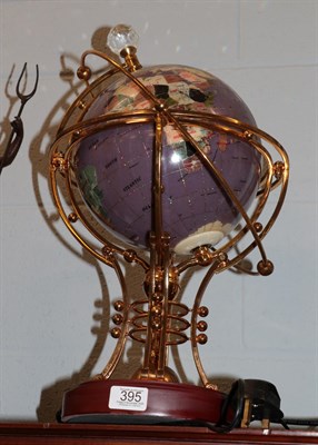 Lot 395 - An Osborne & Allen illuminated and rotary globe, with elaborate gilt metal frame, on plinth base