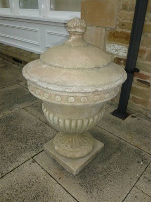 Lot 1138 - A Pair of Composition Garden Urns, of recent date, each moulded with lids and campana shaped...