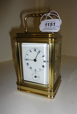 Lot 1151 - A Gilt Brass Alarm Carriage Timepiece, circa 1890, gorge case with bevelled glazed panels and...