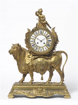 Lot 1160 - A Gilt Brass Striking Mantel Clock, circa 1890, surmounted by a winged cherub and bull on a...