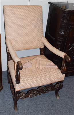 Lot 1243 - A 17th century walnut armchair, later recovered in geometric patterned fabric (wormed)