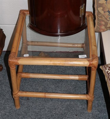 Lot 1248 - Modern items comprising a brown leather armchair; cream coffee table; painted cream mirror; a small