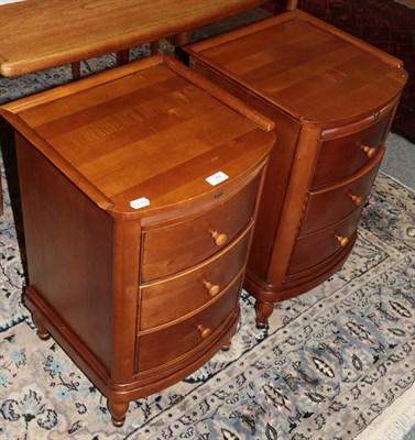 Lot 1258 - A pair of reproduction cherry wood three-drawer chests, labelled Wills & Gambier