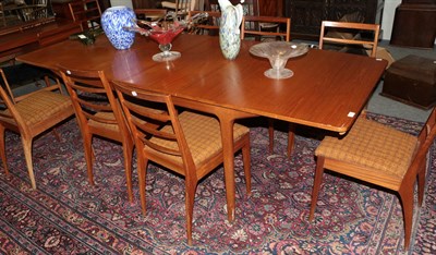 Lot 1283 - A Mcintosh & Co Ltd teak extending dining table, with two additional leaves, 234cm (extended)...