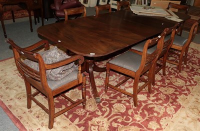 Lot 1289 - A late 19th/early 20th century mahogany twin-pedestal dining table, in the Regency style, 267cm...