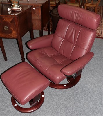 Lot 1293 - An Ekornes Stressless swivel chair and footstool