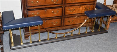 Lot 1302 - A modern studded and brass club fender, external seat measurements 204cm by 54cm by 50cm high