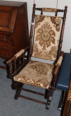 Lot 1303 - A late 19th century turned beech rocking chair