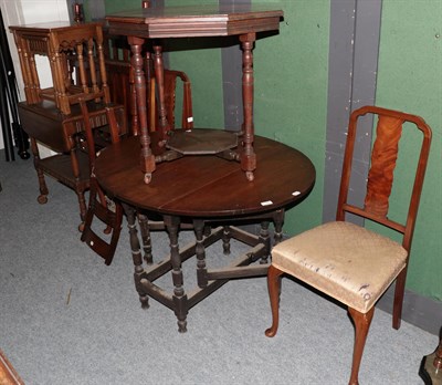 Lot 1306 - A quantity of furniture comprising two mahogany folding cake-stands; an oak drop-leaf dining table