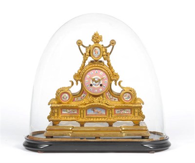 Lot 1168 - A French Gilt Metal and Porcelain Mounted Striking Mantel Clock, circa 1880, surmounted by an...