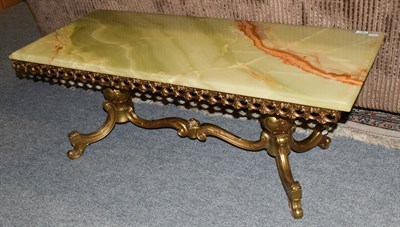 Lot 1322 - A green onyx and brass rectangular coffee table