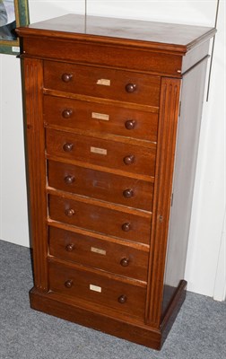 Lot 1328 - A Victorian mahogany Wellington chest, with fluted and lockable stiles, with key, 61cm by 38cm...