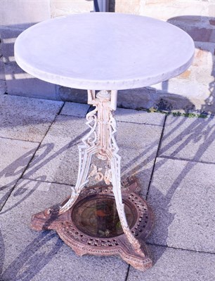 Lot 1331 - A 19th century cast iron garden table, possibly Coalbrookdale