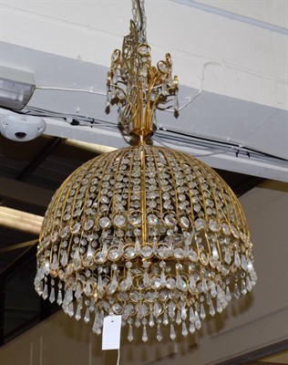 Lot 1335 - A gilt metal lustre drop chandelier