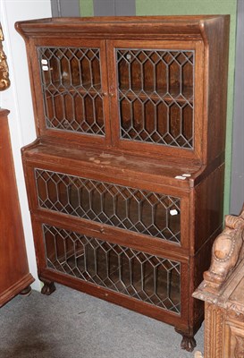 Lot 1344 - An early 20th century leaded glazed sectional bookcase