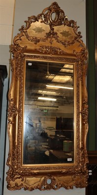 Lot 1346 - A 19th century gilt and gesso pier glass, 160cm by 73cm