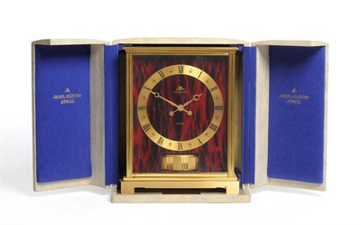 Lot 1171 - A Gilt Brass Atmos Clock, signed Jaeger LeCoultre, model: Embassy, circa 1980, the case with...