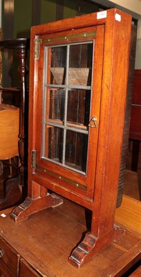 Lot 1367 - A Victorian mahogany small display cabinet with leaded glass door and sledge feet