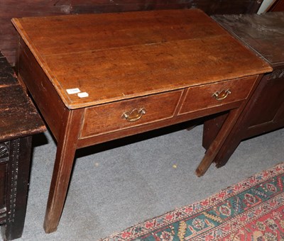 Lot 1386 - A George III oak and crossbanded two-drawer table, 91cm by 50cm by 70cm high