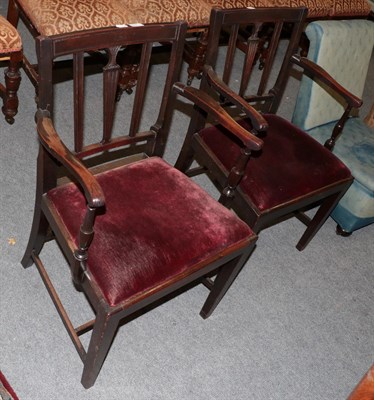 Lot 1395 - A pair of late George III mahogany armchairs