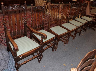 Lot 1408 - A set of seven early 20th century carved oak dining chairs, including one carver (7)