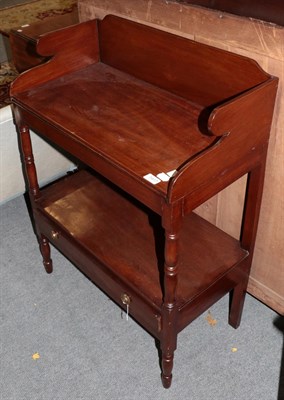 Lot 1417 - A George III mahogany washstand with gallery back