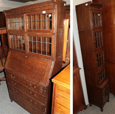 Lot 1423 - An early 20th century Globe Wernicke style narrow cabinet and matching bureau with glazed upper...