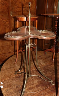 Lot 1425 - An Art Nouveau mahogany cakestand, with pierced gallery