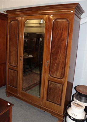 Lot 1450 - A late Victorian walnut triple-door wardrobe