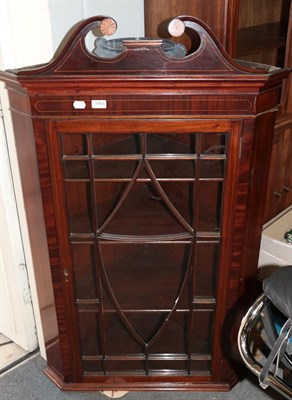 Lot 1453 - Astragal glazed hanging corner cupboard with swan neck pediments