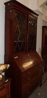 Lot 1455 - A George III bureau bookcase