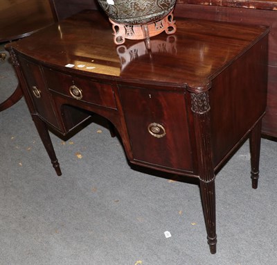 Lot 1461 - A George III style mahogany bow fronted sideboard of small proportions, late 19th / early 20th...