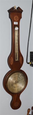 Lot 1466 - A 19th century mahogany and shell-patrae wheel barometer with silvered dial, signed E.Cattania,...