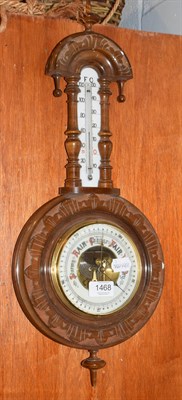 Lot 1468 - A walnut aneroid wheel barometer, circa 1900