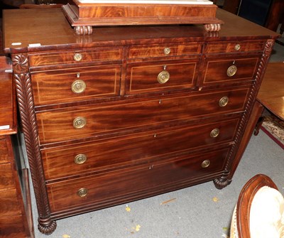 Lot 1471 - A George IV mahogany straight fronted chest of drawers with an arrangement of six small drawers...