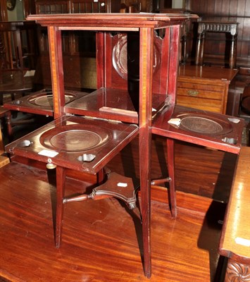 Lot 1473 - An Edwardian mahogany and satinwood banded occasional table/plant stand, with folding shelves, 72cm