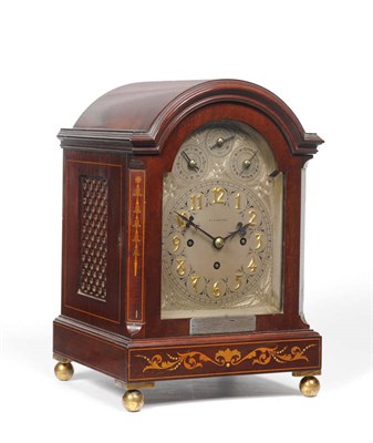 Lot 1185 - A Small Mahogany Inlaid Chiming Table Clock, retailed by Elkington, circa 1900, the arched case...