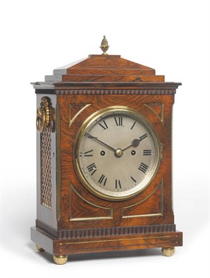 Lot 1192 - A 19th Century Rosewood Striking Table Clock, the chamfered top with pineapple finial, side...