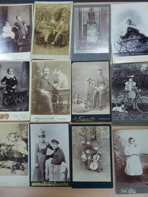 Lot 3232 - Photographs Two hundred and five cabinet cards, predominantly portraits, individual and group,...