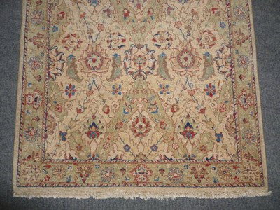 Lot 1234 - Pakistan Wool Runner The fawn field worked with stylised lozenges, 344cm by 103cm