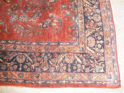 Lot 1237 - Manchester Kashan Carpet Central Persia The tomato field of large flowering vines around a...