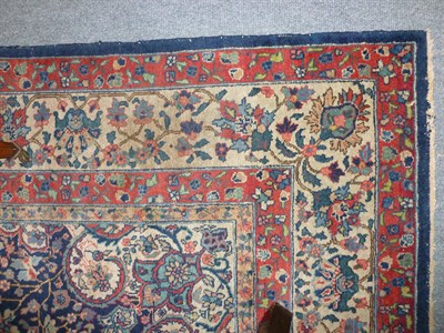 Lot 1239 - Tabriz Carpet Persian Azerbaijan The mid blue field of angular vines around a claret medallion...