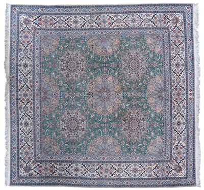 Lot 1240 - Nain Carpet of Unusual Size Central Persia The mint green field with columns of roundel floral...