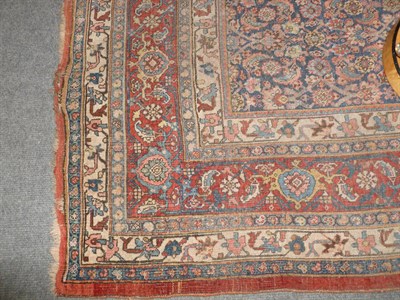 Lot 1245 - Bidjar Carpet West Persia The plain shaded madder field centred by an ivory lattice floral...