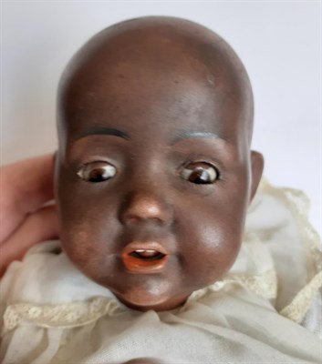 Lot 6000 - J D Kestner Bisque Socket Head Coloured Doll 'Hilda' '245 1914', with character face, open...