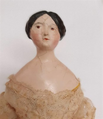 Lot 6005 - Early 19th Century Papier Mache Head and Shoulder Doll, with black painted hair, pink cheeks...